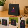Bolsa de papel negra premium personalizada con asas y logotipo para tiendas