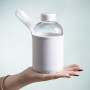 Bidón de cristal personalizado de 600 ml con funda y logotipo para empresas
